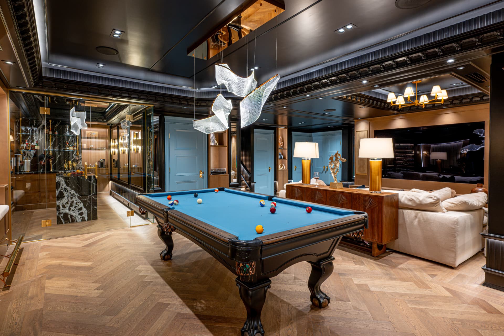 Elegantly designed billiards room with pool table